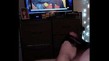 Enjoying a video and my hairtoy.
