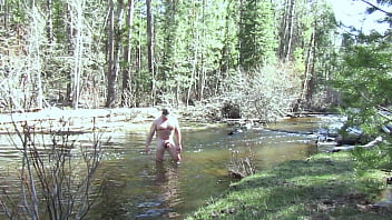 Naked bathing in the river.