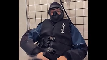 Guy gets his Water-Tight suit filled with Water