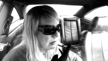 Blonde Mature Mrs. Roman smoking a More 120 menthol in her car
