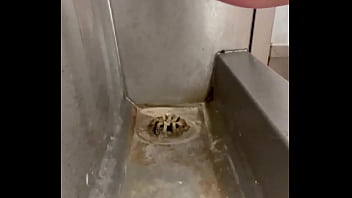 Licking a filthy public urinal