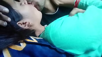 Kissing and pressing boobs of girlfriend