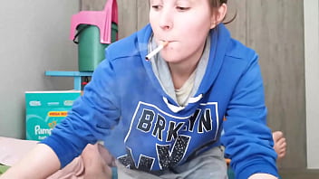Brunette in Hoodie Sucking Cock