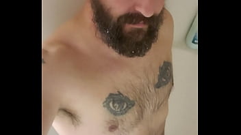 Anthony Arden stroking in the shower